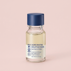 Overnight Blemish Drying Lotion 10ml bottle on a soft pink background